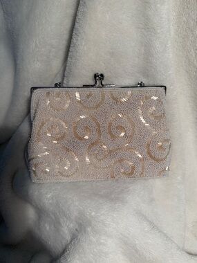 Stunning Ivory Beaded Swirl Clutch with Silver Hardware
